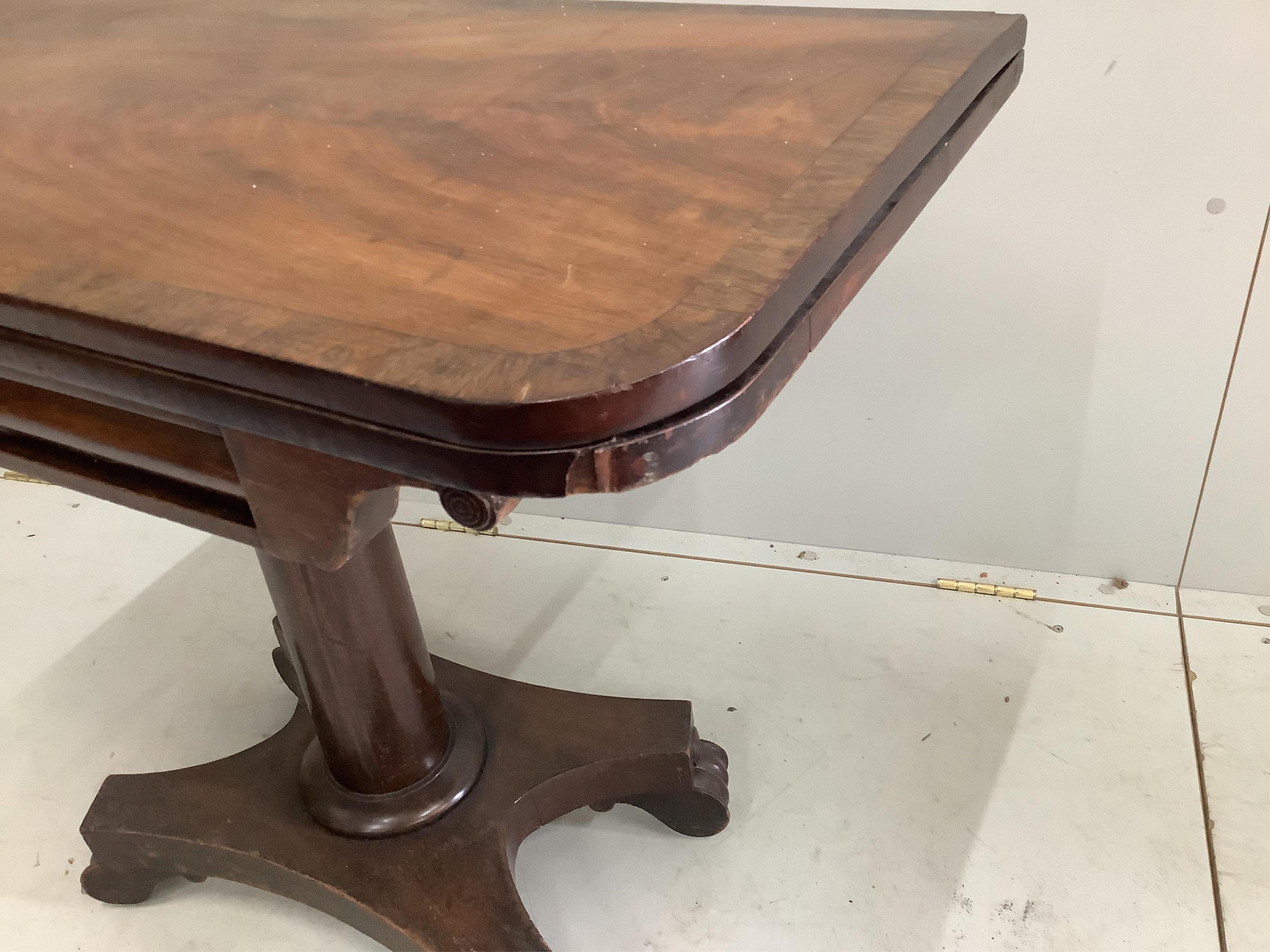 An early Victorian rosewood banded mahogany folding card table, width 90cm, depth 45cm, height 73cm. Condition - fair